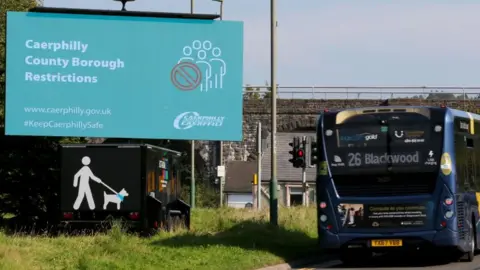 Getty Images Sign on Covid restrictions in Caerphilly