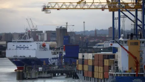 Reuters A ferry arriving at Belfast port