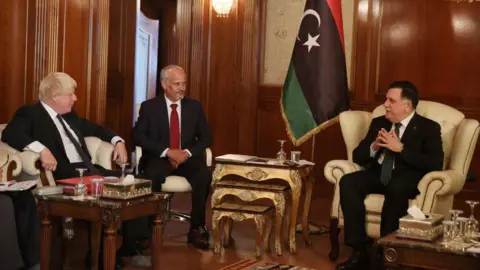 Reuters Boris Johnson meets Fayez Sarraj