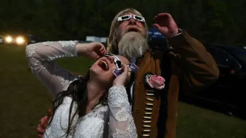 Getty Images A couple who took part in a mass wedding in Arkansas