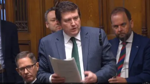 Northampton South MP Andrew Lewer speaking in the House of Commons