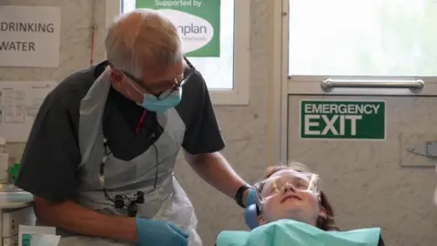 BBC Pupil Jenna seeing one of the Dentaid dentists