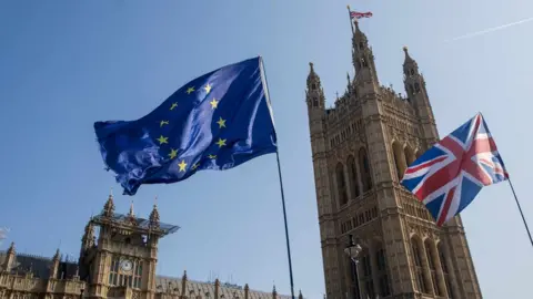 Getty Images EU and UK flags outside Westminster