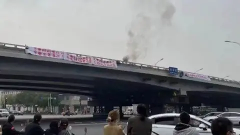 Twitter Photo of the banner on the bridge