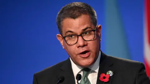 AFP Britain's President for COP26 Alok Sharma speaks at The Procedural Opening of the COP26 UN Climate Change Conference in Glasgow, Scotland on 31 October 2021