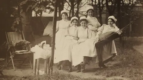 University Hospitals Birmingham NHS Trust Nurses at the hospital relaxing, date unknown