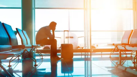 Getty Images Man in airport
