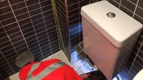 Cambridgeshire Fire & Rescue Service Cat stuck in soil pipe