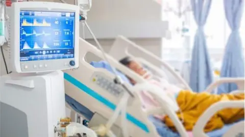 Getty Images Patient in a hospital bed