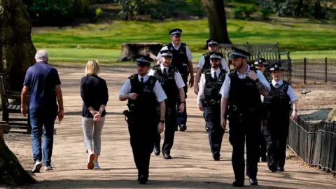 Getty Images Police patrolling a park