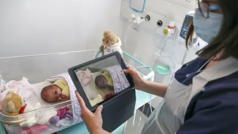 Getty Images Baby being filmed on an iPad in May 2020