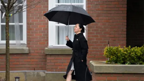 Reuters Meng Wanzhou leaves her home to attend her extradition hearing at a Vancouver court in January