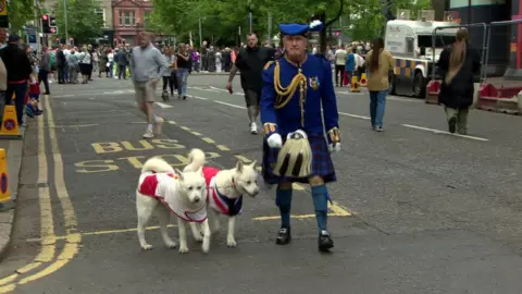 Two dogs and a man