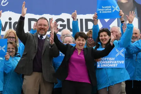 Getty Images David Duguid campaigns alongside Ruth Davidson