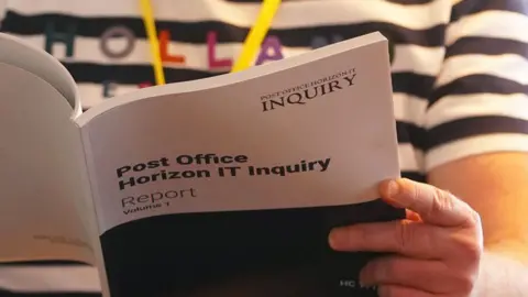 Someone reading the Post Office Horizon IT Inquiry Report Volume 1
