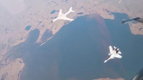 Aerial view of a Chinese H-6K bomber and a Russian Sukhoi Su-30CM jet fighter during Wednesday's patrol near Alaska