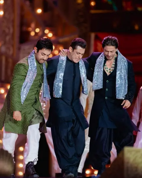 Reuters Actors Aamir Khan, Salman Khan and Shah Rukh Khan perform during the pre-wedding celebrations of Anant Ambani, son of Mukesh Ambani, the Chairman of Reliance Industries, and Radhika Merchant, daughter of industrialist Viren Merchant, in Jamnagar, Gujarat, India, March 2, 2024