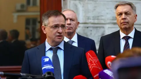 EPA Russia's medinsky, left