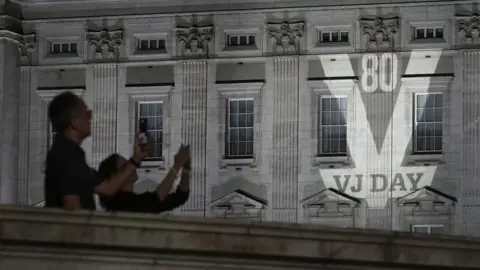 PA Media Images projected onto Buckingham Palace, London, recognising the contribution of the Commonwealth Armed Forces to the Second World War, ahead of the 80th anniversary of VJ Day.