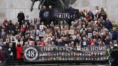 PA Media Survivors and family members in the Garden of Remembrance in Dublin