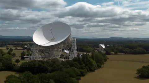 Reuters An aerial photograph taken with a drone of the Lovell Telescope at Jodrell Bank Observatory in Macclesfield, Britain, 28 July 2026. 