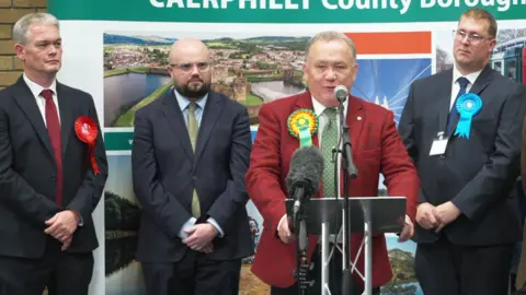 Caerphilly bi-election candidates stand in a row