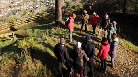 A community mindfulness event held at MWT Hairpin Woodland Park with views over Ramsey
