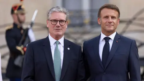 EPA British Prime Minister Sir Keir Starmer (left) and French President Emmanuel Macron (right) photographed together at the Elysee Palace in Paris, France, 28 August 2024.