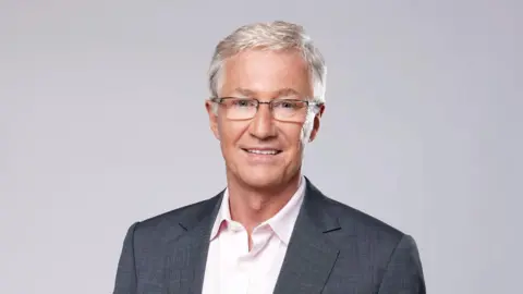 BBC/Jude Edginton A headshot of Paul O'Grady