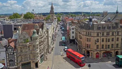 Aerial view of Oxford City Center and the busy roads with buses on.