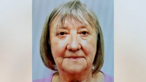 Police Scotland A woman with short blonde-ish hair and brown eyes looks into the camera