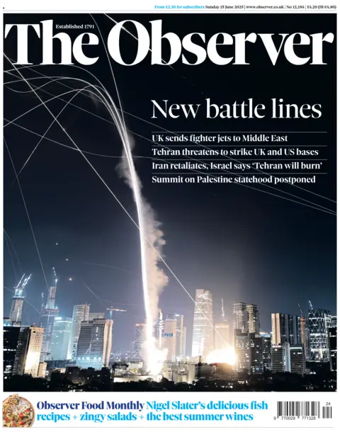 A large image of the Tel Aviv skyline at night. The trail of missiles can be seen streaking through the sky, with blasts on the ground. The headline reads "New battle lines".