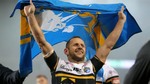Rob Burrow celebrates during his time with Leeds Rhinos
