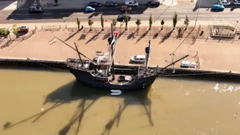 An aerial drone picture of the Nao Victoria replica ship docked at South Quay in Great Yarmouth. The picture has been taken from above.