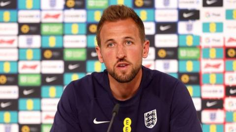 Harry Kane speaks at an England news conference
