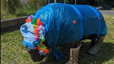 Decorated wooden sheep