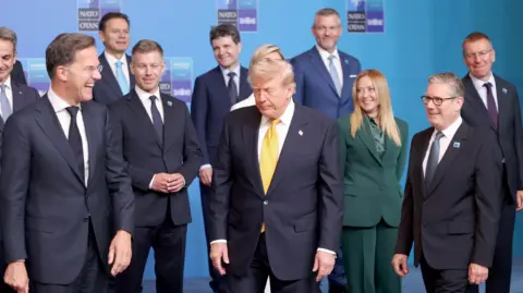 EPA Nato Secretary General Mark Rutte (L) laughs with other Nato leaders including Hungarian PM Peter Magyar, President Trump, Italian PM Georgia Meloni and UK PM Keir Starmer.