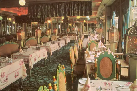 Veeraswamy Veeraswamy restaurant in 1947, with tables laid and brightly coloured furniture