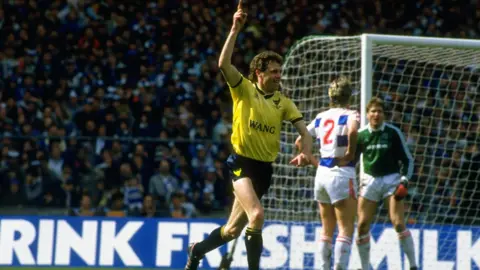 David Cannon/Allsport Trevor Hebberd (left) of Oxford scores the first goal during the Milk Cup Final against Queens Park Rangers at Wembley Stadium in London.