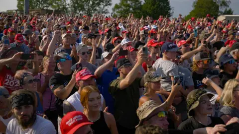 Getty Images Crowds of thousands turned out to see Trump