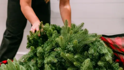 ARtificial Christmas tree being taken out of a box