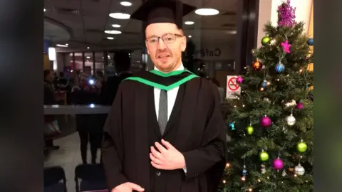Mullin family Leonard at his graduation a number of years before his accident