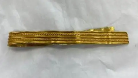 Close-up of a Roman gold bracelet discovered by a 12-year-old boy while walking his dog at Pagham.