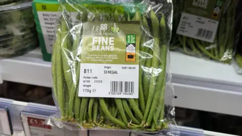 A packet of Senegal-grown fine beans on the shelf at UK supermarket Co-Op