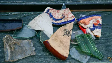 Borough Council of King's Lynn and West Norfolk Brightly coloured shards of pottery dating back to the 1920s, which were used in the construction of the original prom. 