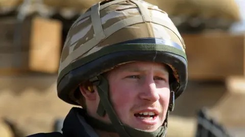 AFP via Getty Images Prince Harry sits in an area of the observation post on JTAC Hill, close to FOB (forward operating base) Delhi, on January 2, 2008 in Helmand province