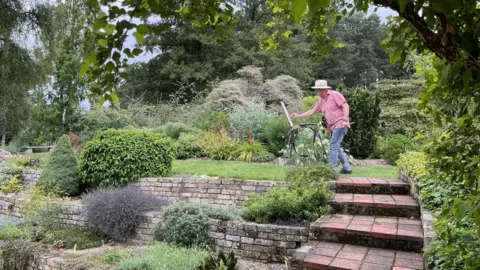 Shaun Whitmore/BBC Andriy Nekrasov in Fullers Mill garden