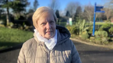 Photograph of 77 year-old Carol Knight from the Derker area of Oldham. She is pictured in Stoneleigh Park. 