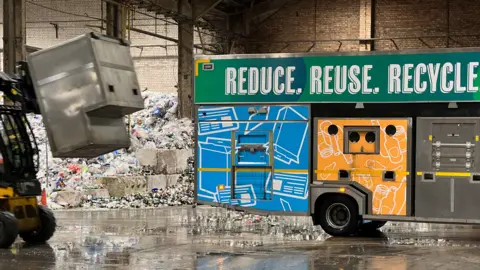 recycling truck in a recycling centre