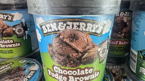 Getty Images Tubs of Ben and Jerry's Chocolate Fudge Brownie ice cream in a freezer at a supermarket.